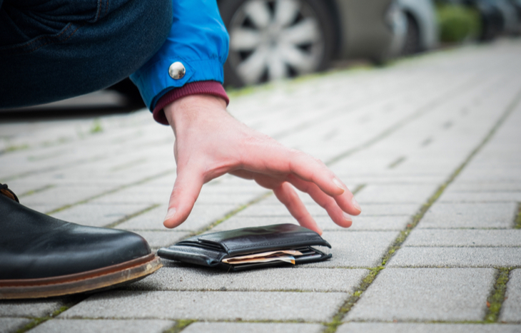 how to find unclaimed money like this person picking up a wallet