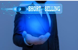 A businessman short sells a stock after learning how to short a stock