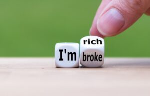 What is the difference between rich and wealthy? These dice reveal the thin line between "rich" and broke.