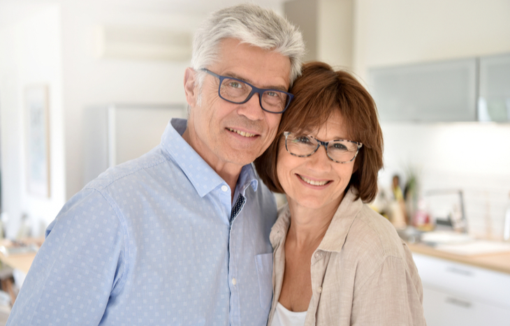 A happy couple after learning how to retire at 55 years old