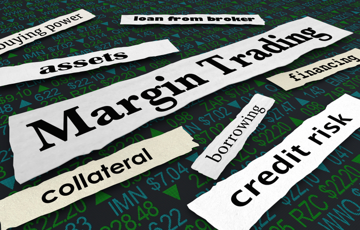 Newspaper clips of margin trading over ticker symbols