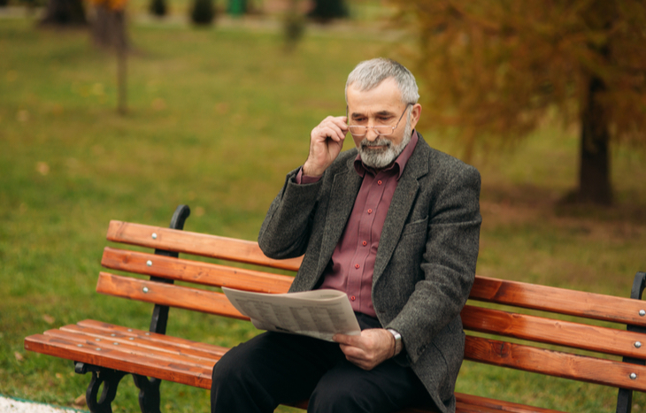 A man pondering his early retirement withdrawal strategies