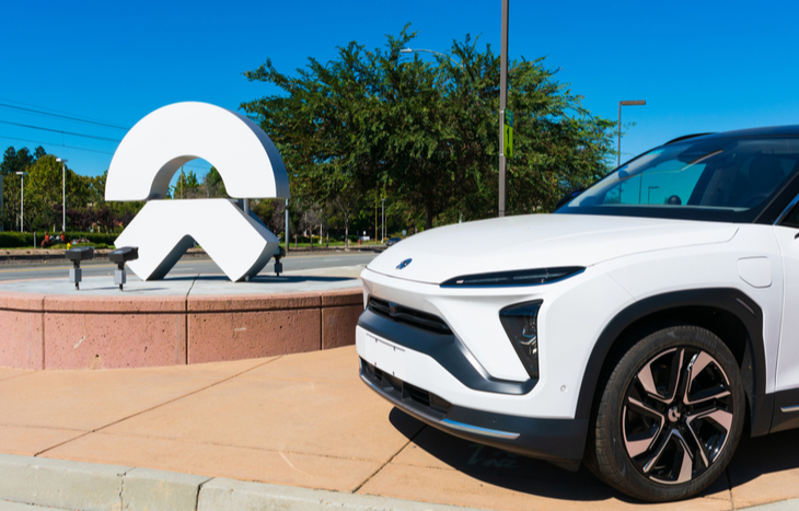 NIO stock logo and electric car